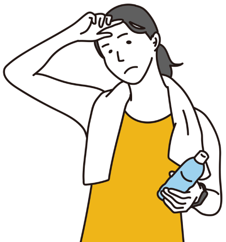 汗を拭いている女性